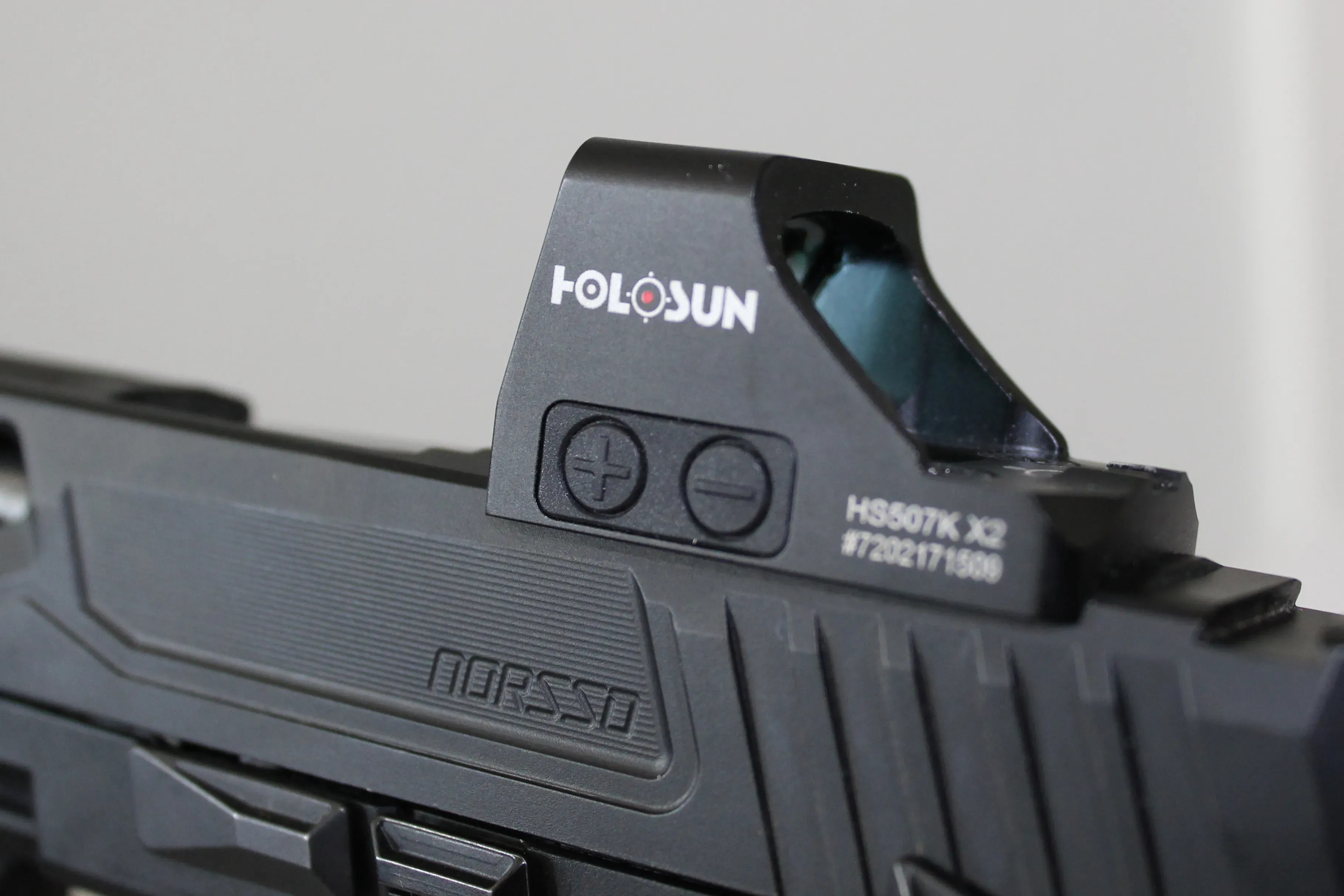 Holosun 507K X2 brightness adjustment buttons mounted on handgun